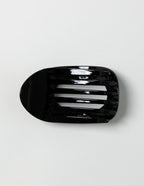 SaltyKurlz flat claw clip in black— low-profile no-bump hair clip