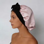 Woman wearing SaltyKurlz mulberry silk bonnet — protects all hair types overnight